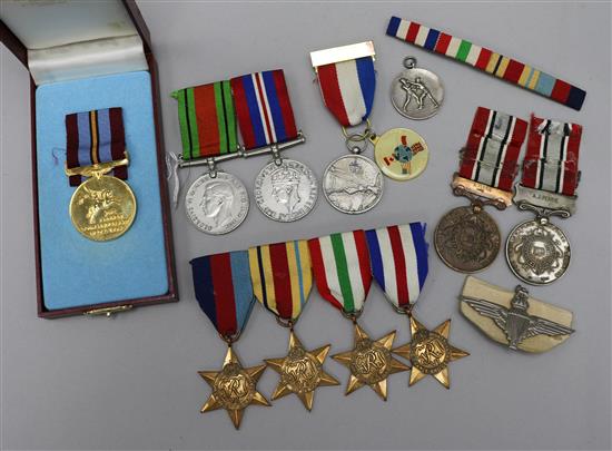 A collection of assorted WWII medals and a Fire Service medal to A. Perrie.